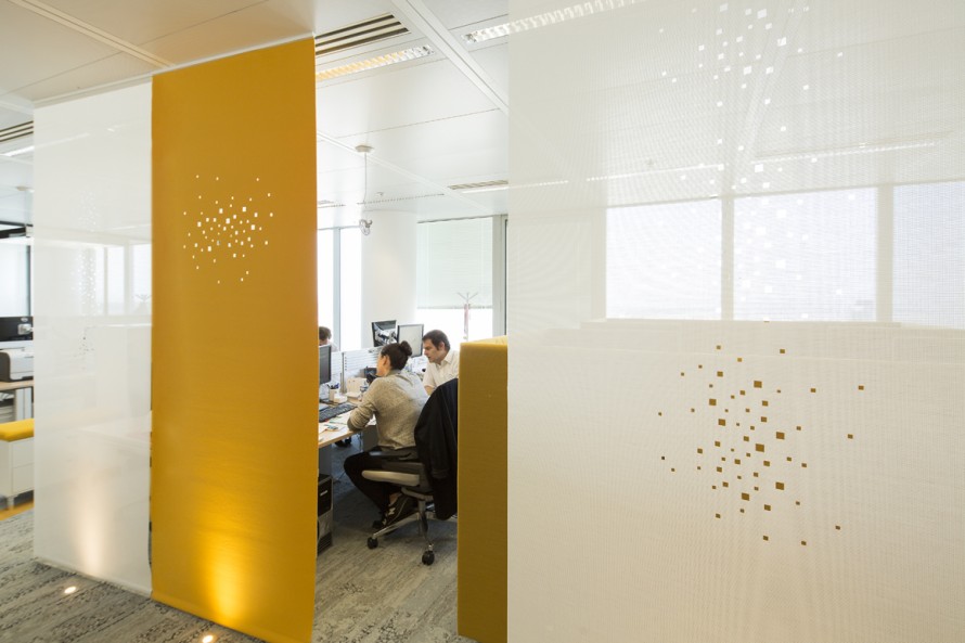 Space dividers in yellow felt with our « city lights » design & in white sun screen mesh with our « little windows » design 